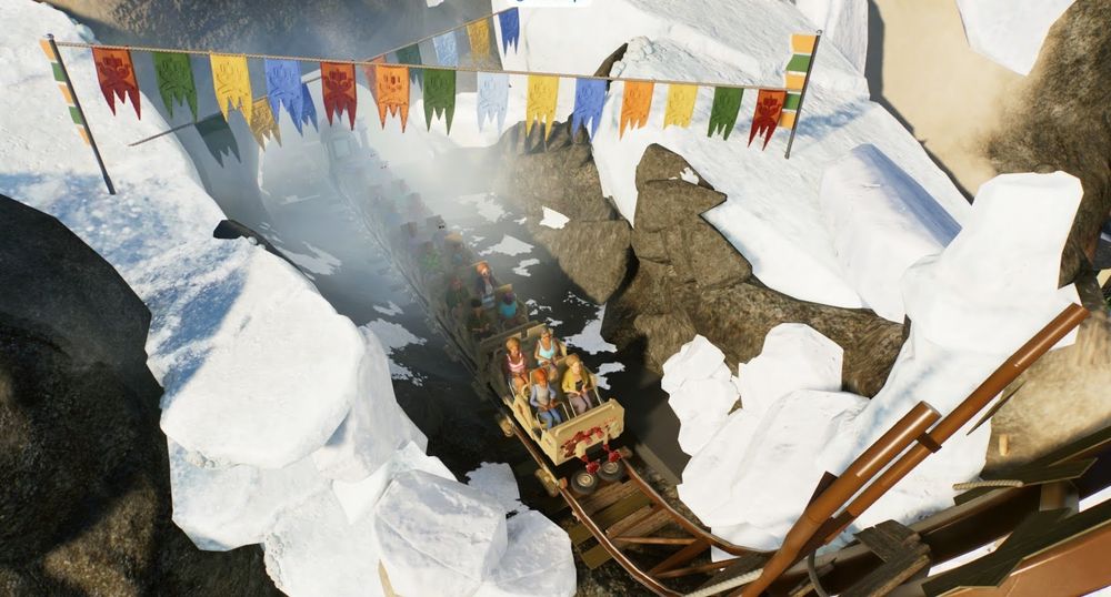 Planet Coaster 2 recreation of the Broken Trestle scene of the Expedition Everest ride at Animal Kingdom, a roller coaster steam train sits in front of the track ripped up by the mysterious Yeti. 