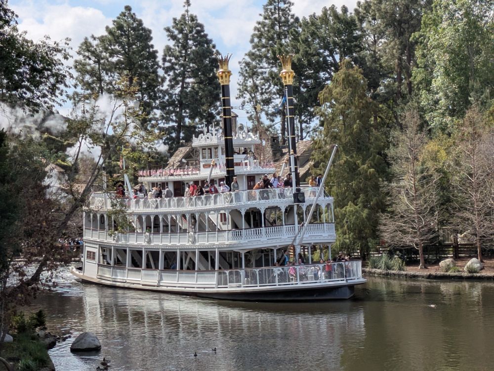 The Mark Twain Riverboat rounds a corner on the Rivers of America at Disneyland.