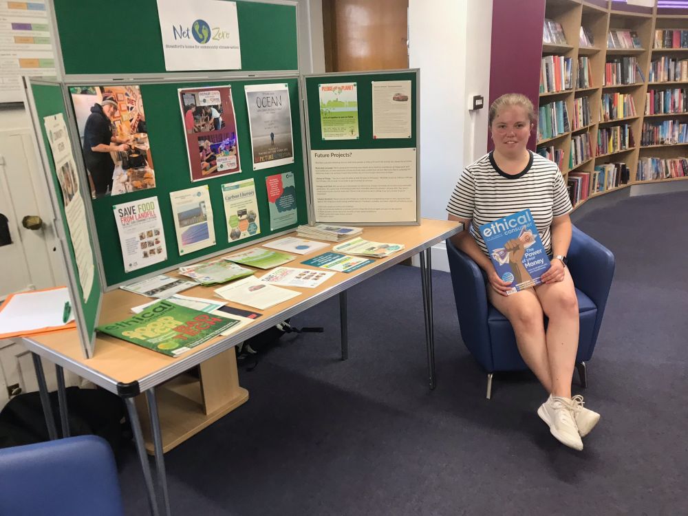 Hannah staffing the NetZero/Stratford Climate Action stand in Stratford-upon-Avon public library.