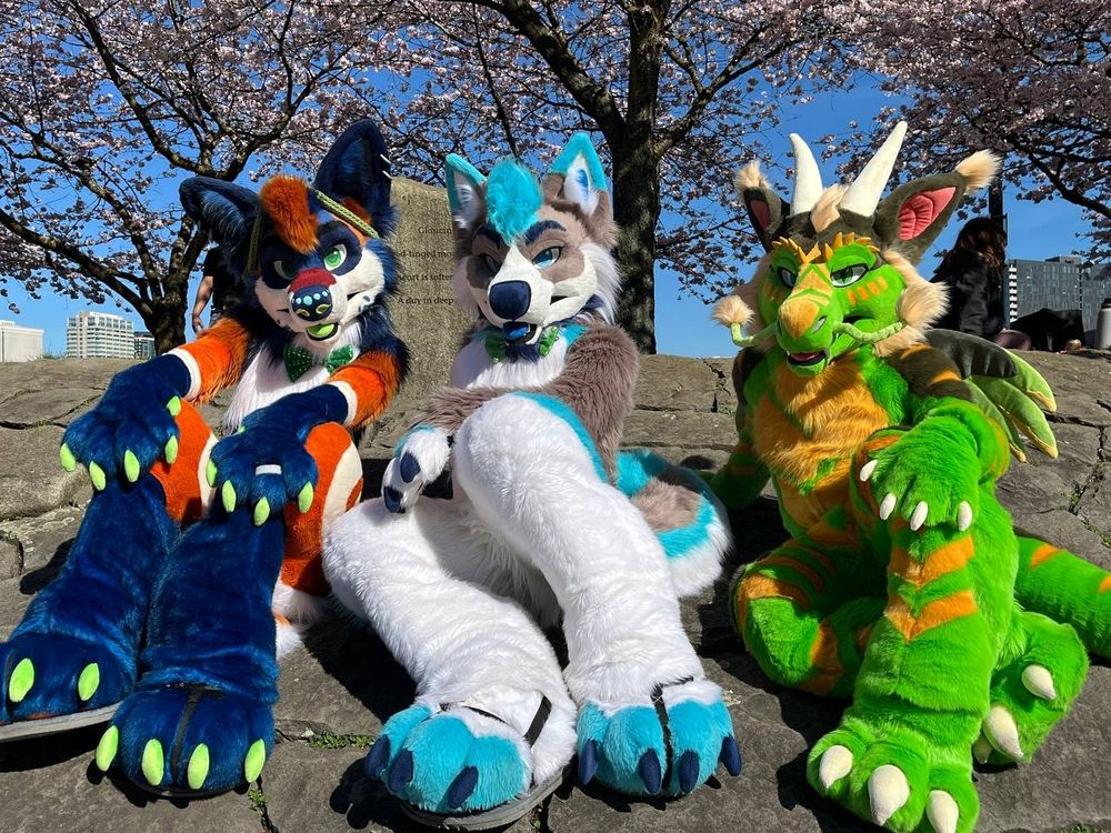 Fursuits from left to right, TeaRexee, Frost T. Husky, and Rathtolar