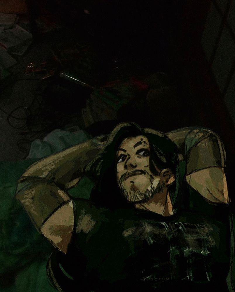 my oc except he’s been goth/metalhead-ified laying on the ground of dark background photo i found on pinterest 
