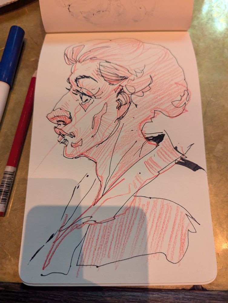 Drawing in black ink and red pencil of a slightly androgynous person.