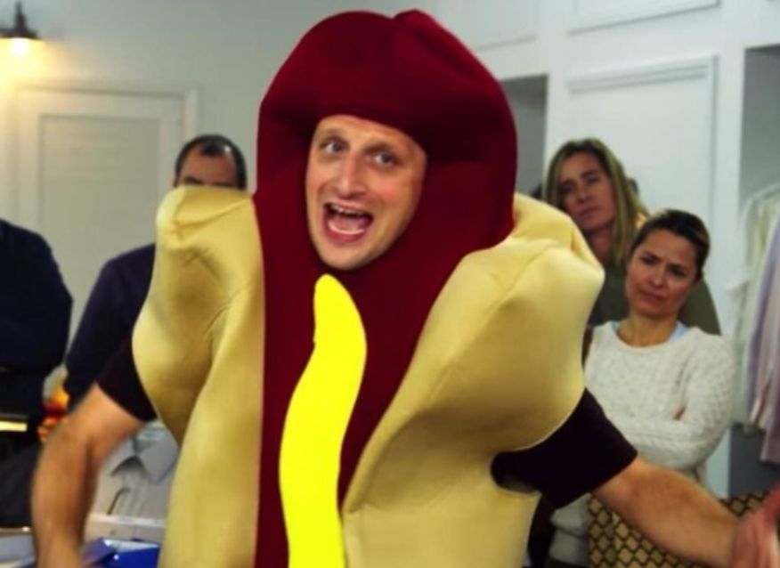 "We're all trying to figure out who did this" hotdog man looking weirdly like a Real Housewife of Cheshire