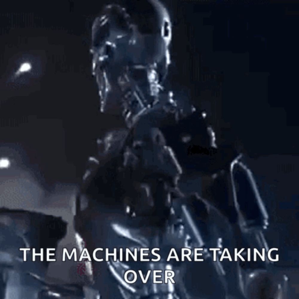 a picture of a robot with the words " the machines are taking over " on it