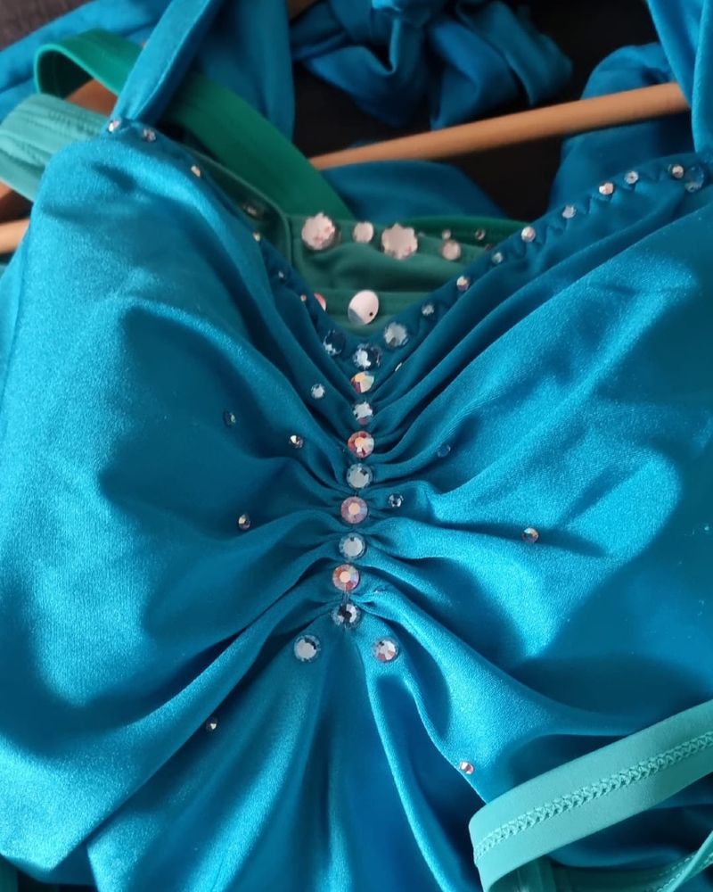 turquoise costumes with rhinestone bling