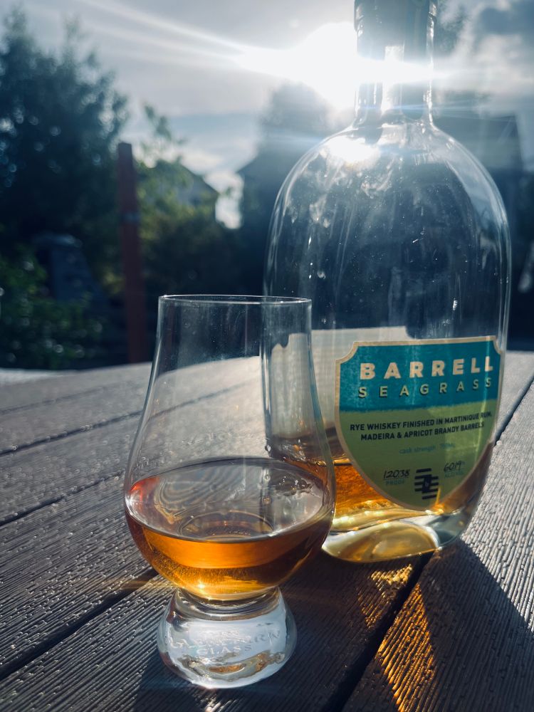 A Glencairn glass with a bit of American whiskey