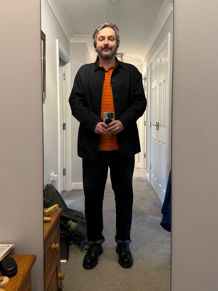 Me stood in my hallway wearing. 
Percival waterproof overcoat. 
Kestin orange hooped polo shirt. 
Indigo Edwin jeans. 
Dr Martin mock toed, crocodile leather shoes. Brown. 