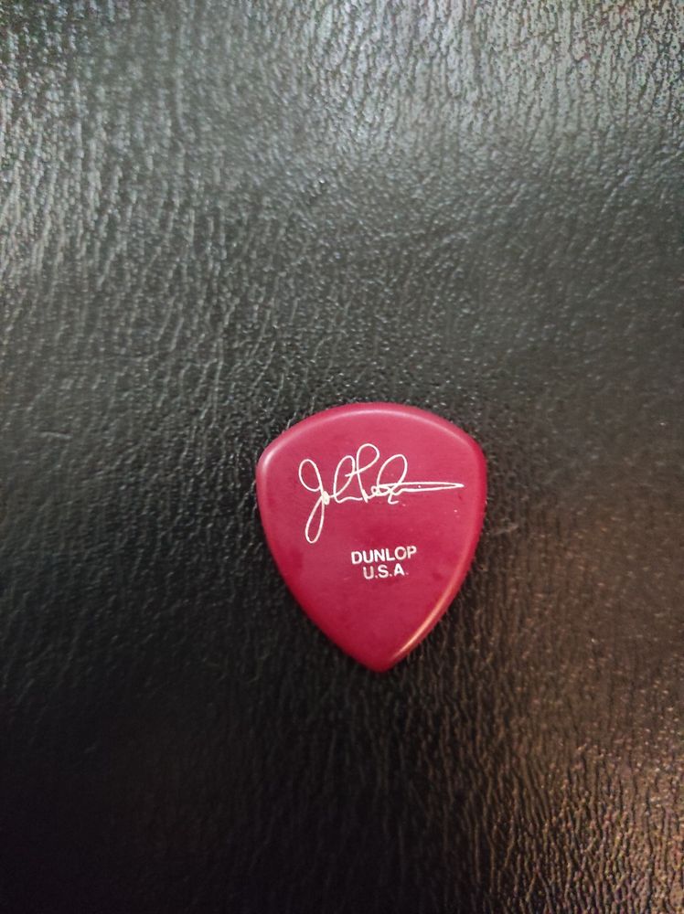 John Petrucci's signature.