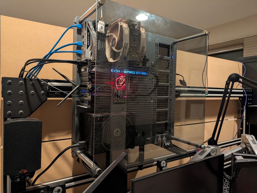 My current hanging PC setup using a thermaltake core p5. It has a Visa mount on the back which is how it's mounted to my desk.