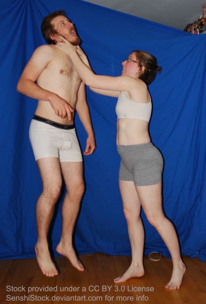 thin white female model holding a male model up by his neck