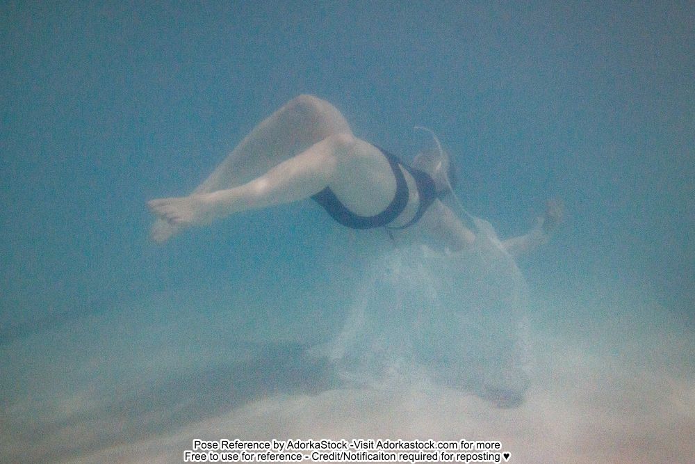 murky underwater photo of a model with the feet closer to the camera, head away, belly up as if sinking 