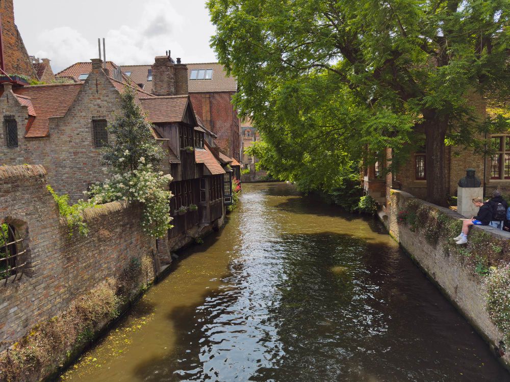 A view of the canal in Brugge behind the cathedral 