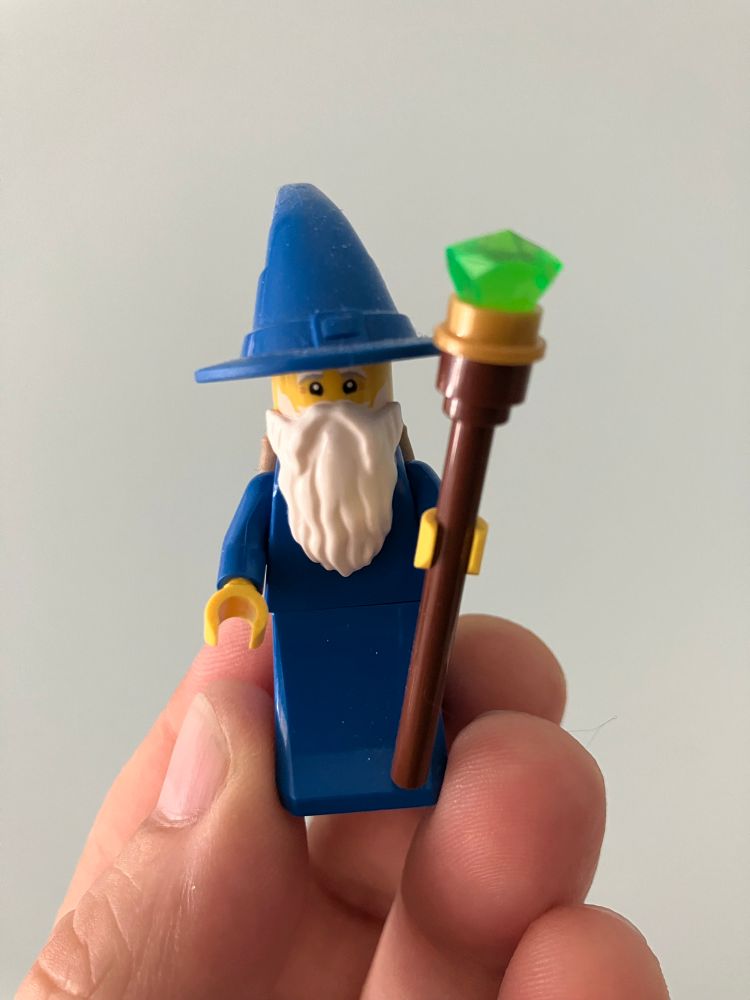 LEGO Wizard in blue robe an hat with green gem staff