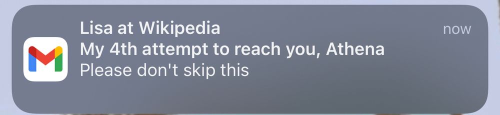 A Gmail notification from “Lisa at Wikipedia” that reads “My 4th attempt to reach you, Athena. Please don’t skip this.” 