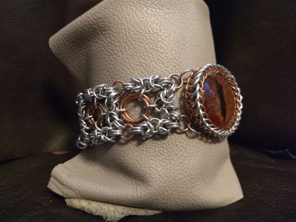 Striking Dragon Eye on a byzantine/moebius chainmail bracelet