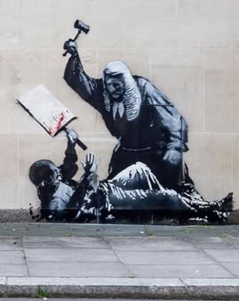 photo of the mural described in quoted post