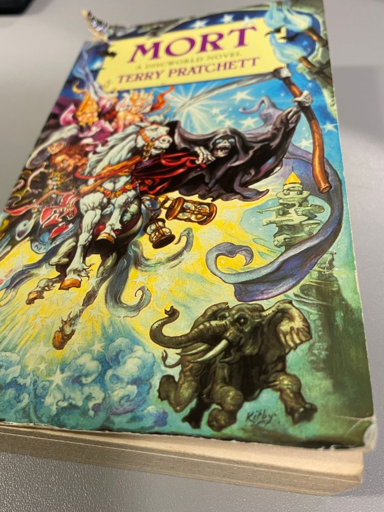 A rather battered copy of Mort by Terry Pratchett