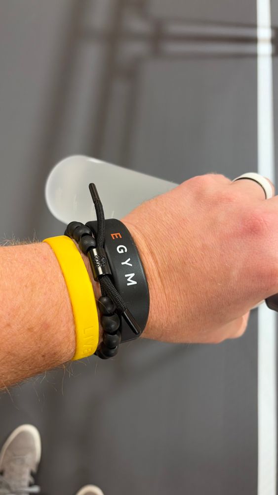 Three bracelets and a water bottle 