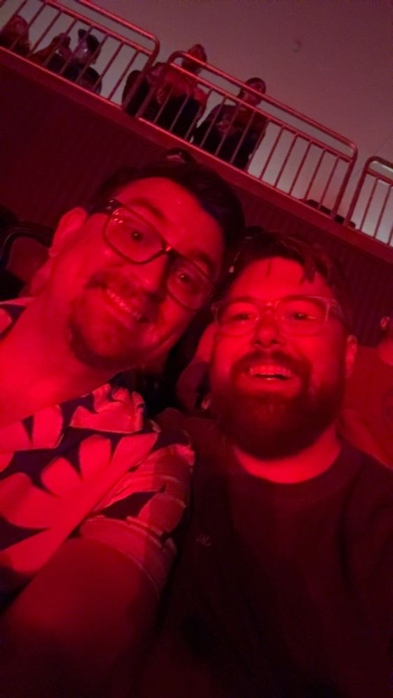 Trent and Ross in a red glow before Lady Gaga’s Mayhem Ball