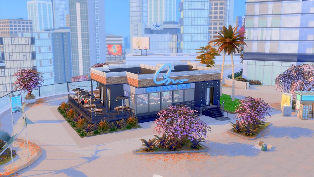 A photo of a karaoke bar in San Myshuno. It's surrounded by palm trees, punk bushes and high rise buildings.
