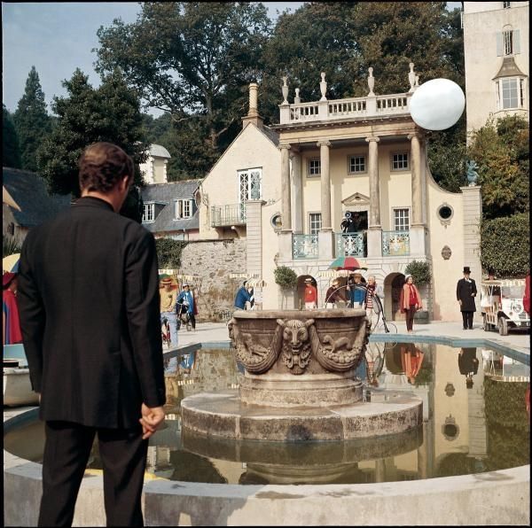 The Prisoner looking at Rover across the fountain in The Village 