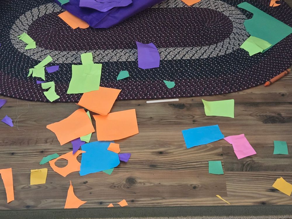 A bunch of little pieces of construction paper 