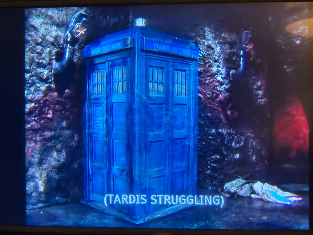 Image of the TARDIS from Doctor Who Time-Flight episode three with the caption "(TARDIS STRUGGLING)" 