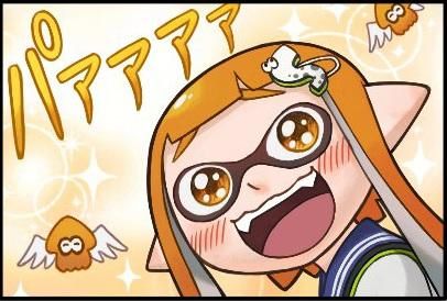 An inkling looking happily at the screen