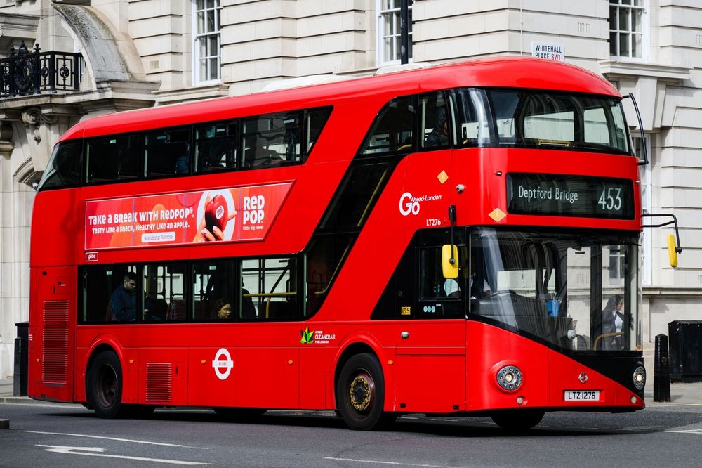 A red london bus number 453