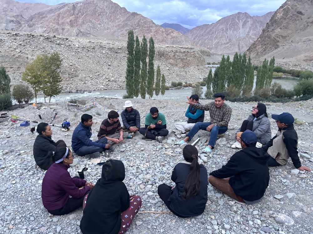 Fourth Indus River walk, 28th-31st August 2025

The fourth Indus River walk by Kalpavriksh and Snow Leopard Conservancy India trust was hosted on the banks of river Indus close to Shaara village where the team camped for 3 nights. The group trekked to Shaang valley where they learned about the intrinsic connection of snow leopards and other trans himalayan wildlife with rivers. The walk was filled with creative activities such as river meditations, nature writing, birding, story telling, painting and understanding interdependence of riverine communities including humans and more than humans and lots of singing along the Singee Khababs. The walk was joined by students of Ladakh university, members of Tar village, and members of KV and SLC-IT. 
This year's walk was a constant reminder of how climate change is impacting river ecology, and transforming our ecosystems at an accelerated and drastic rate.
