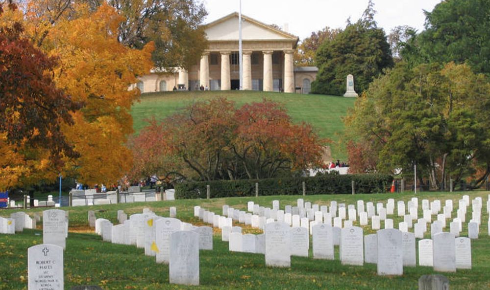 View of Arlington National Cemetery graves with Lee's former house in the background