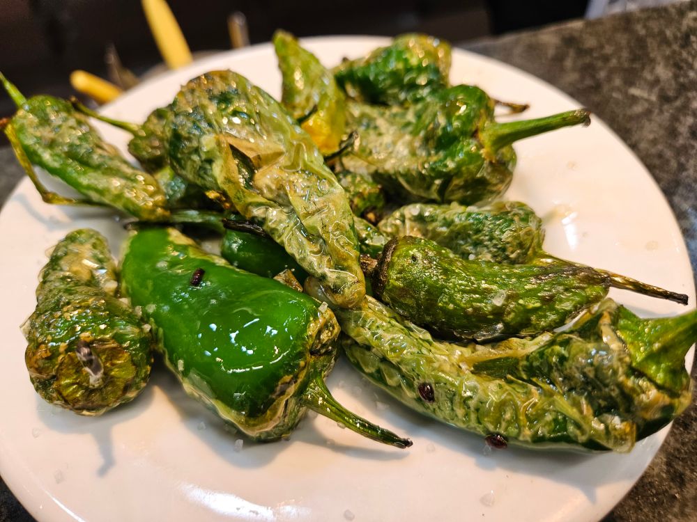 Fried and salted Pádron peppers at Bar Joan, Mercat de la Santa Caterina, Barcelona, Spain 