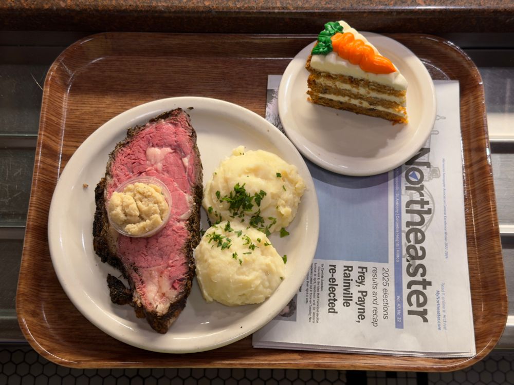 Steak of prime rib with raw horseradish; carrot cake; Northeaster paper newspaper 