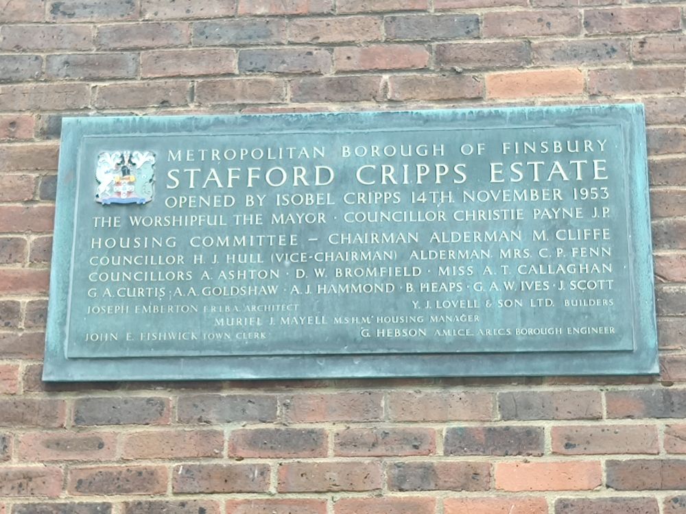 Bronze dedication plaque:
METROPOLITAN BOROUGH OF FINSBURY
STAFFORD CRIPPS ESTATE 
Listing architects, engineers, etc.