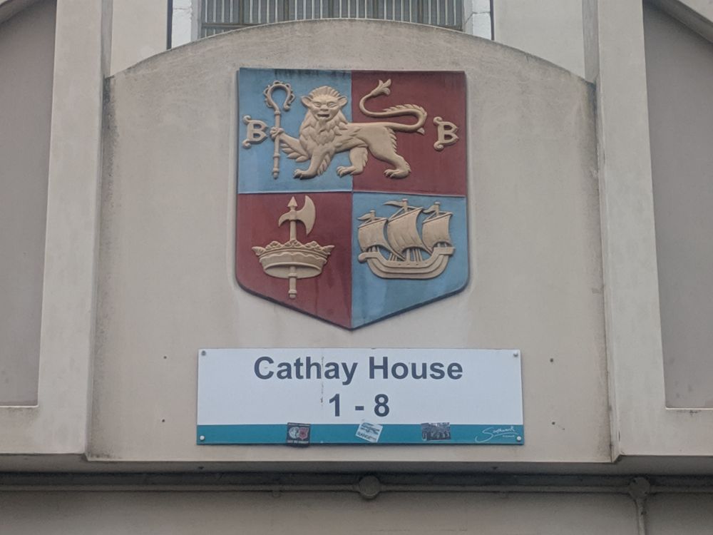 Metropolitan Borough of Bermondsey coat of arms, with a modern Southwark council sign below