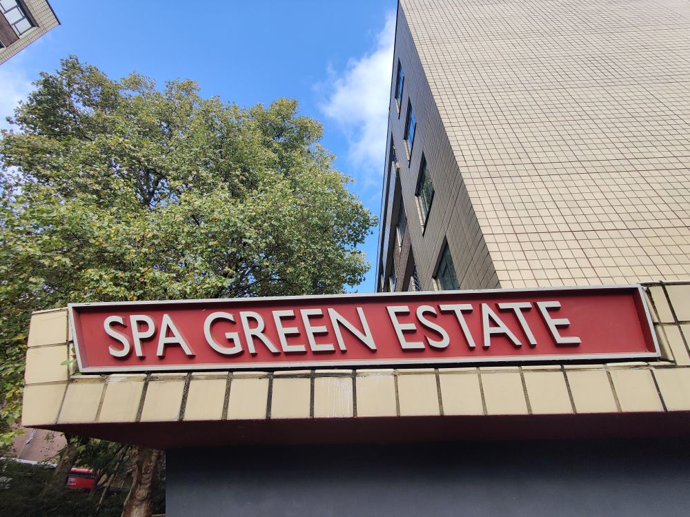 White on red SPA GREEN ESTATE 3D sign