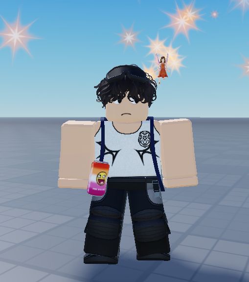 a screenshot of a roblox avatar. he has a nervous expression and is looking to one side. he has curly brown hair, goggles on his head, is wearing black pants and a white vest. flying over his left shoulder is the fall fairy item, a small fairy in an orange dress. the fairy is emitting pale orange sparkle particles. 