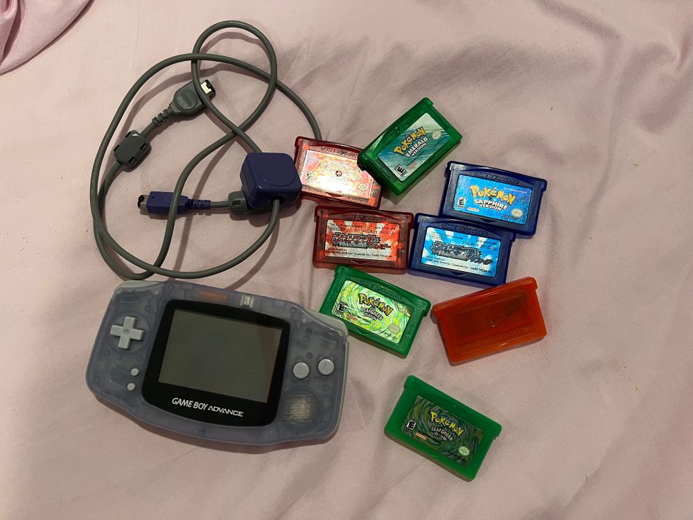 My collection of GBA Pokemon games (mainline), including every game in English, an extra LeafGreen, and Japanese copies of Ruby and Sapphire with Link Cable