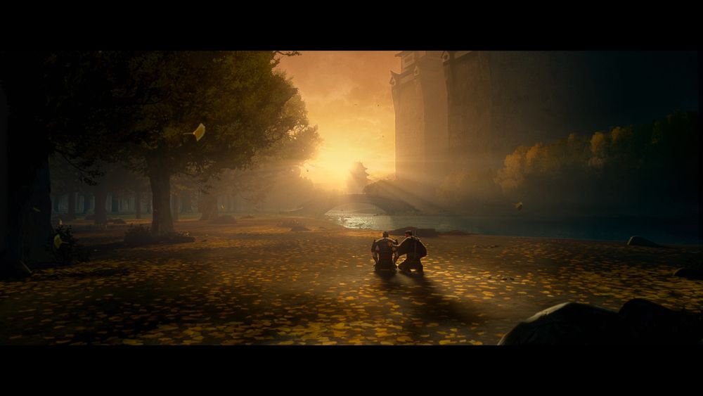 Screenshot from the movie "Predator Killer of Killers" showing two men kneeling in a field of golden leaves looking out at a beautiful sunset.