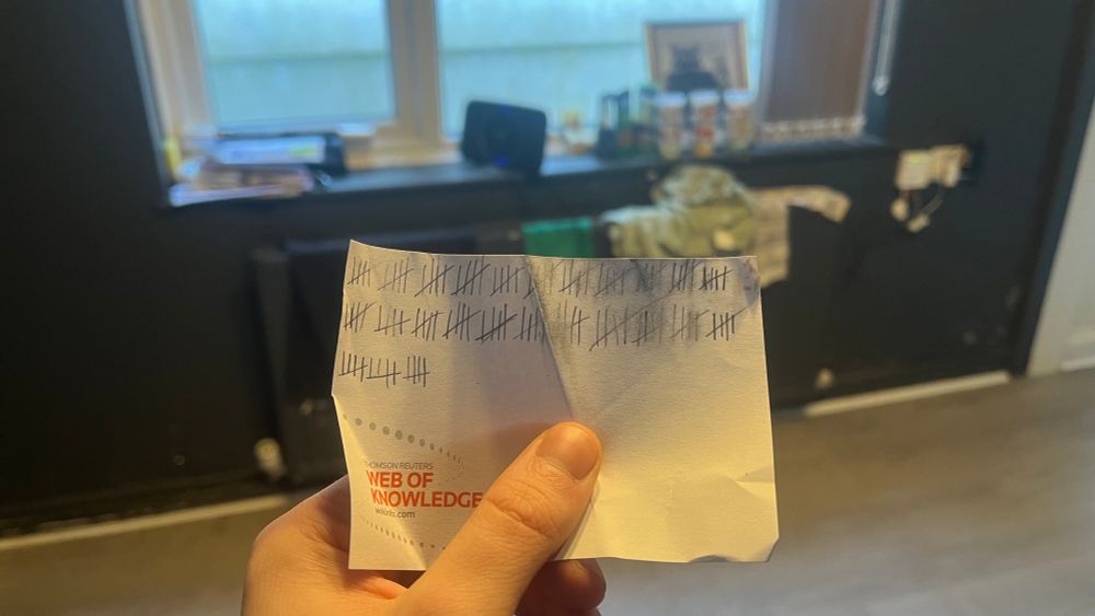 piece of paper with a large tally count scribbled on