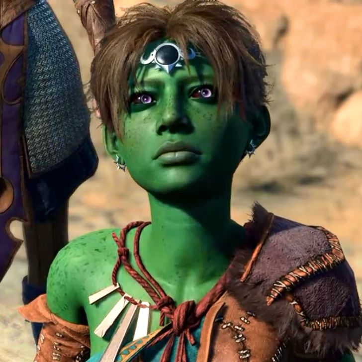 close-up of green halfling barbarian from baldur’s gate 3