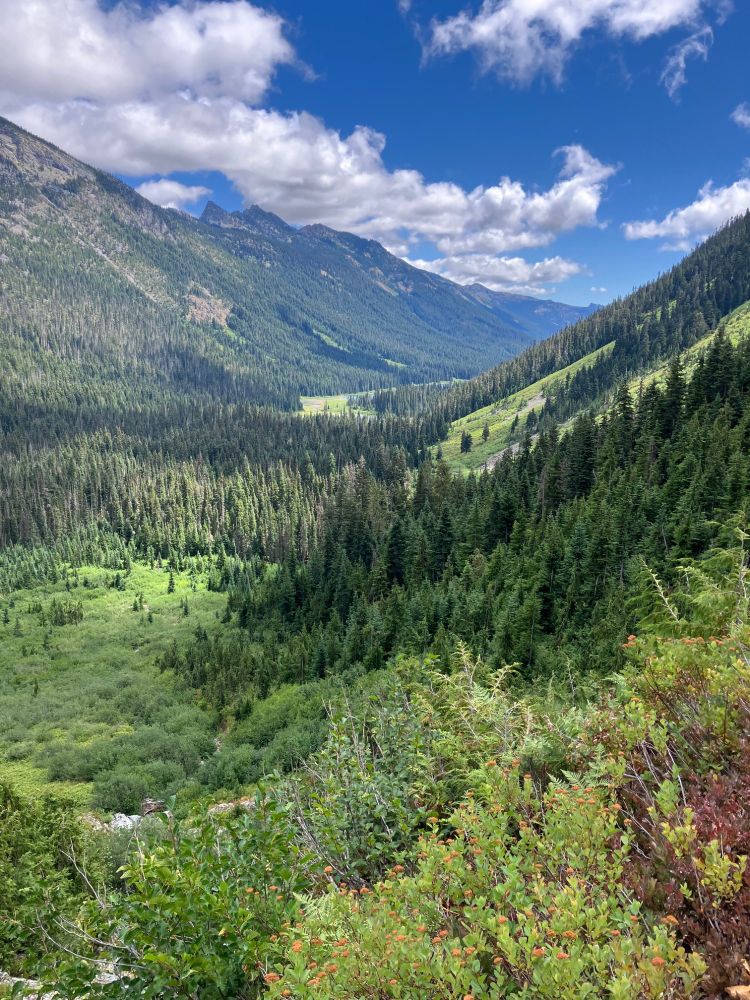 a gorgeous mountain valley during a sunburst