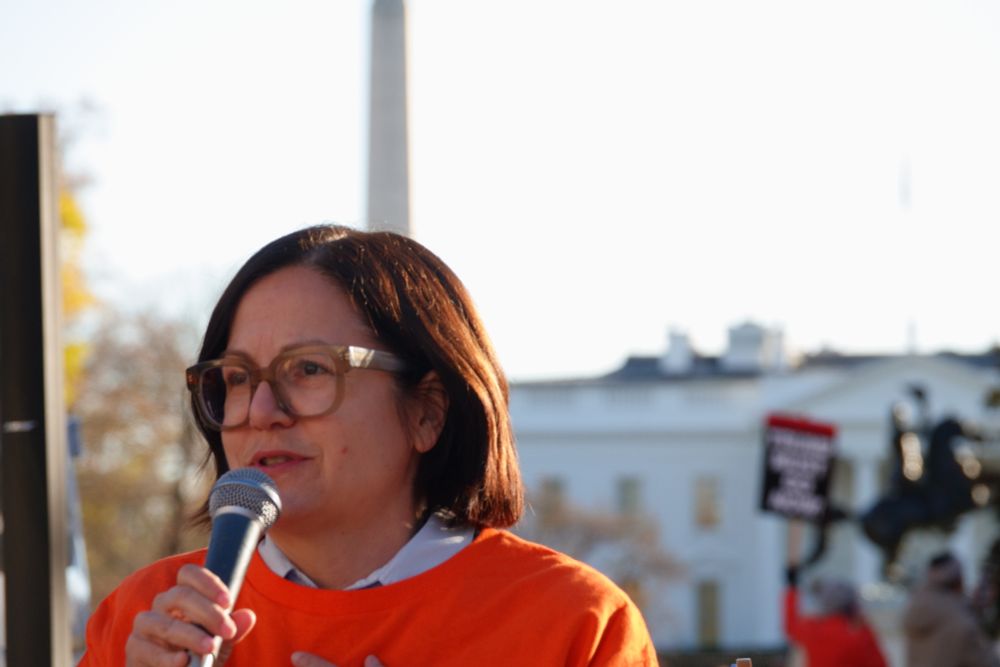 Refuse Fascism co-founder Sunsara Taylor speaks to the rally in front of the White House