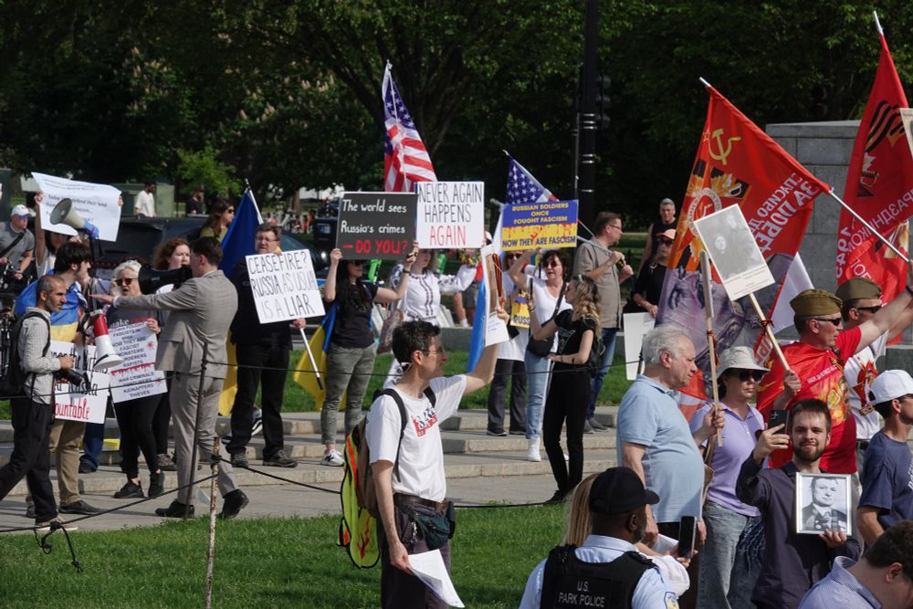 Russian rally in foreground, Ukranian counter-protest in background