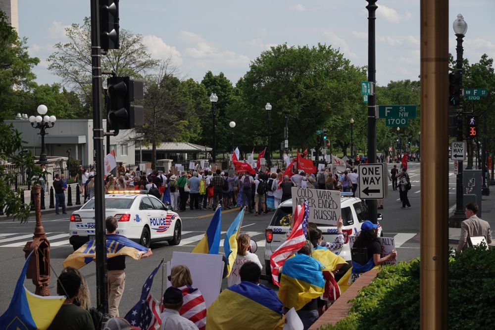 Both Ukrainian and Russian groups march separately down 17th St NW