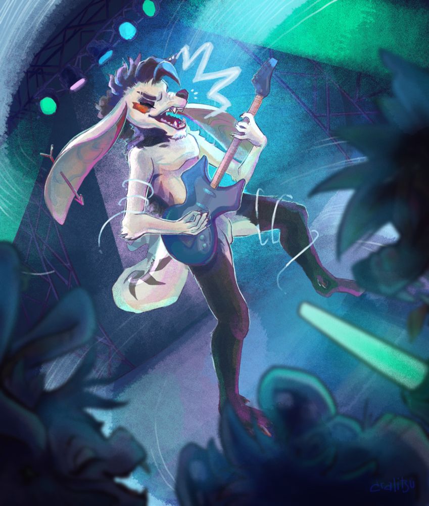 A furry character named Jolu is giving it his all playing the guitar on a stage during a rock concert at night. Several fans can be perceived cheering him on. 