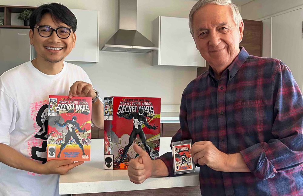 Francis and I with signed Spider-man figure.