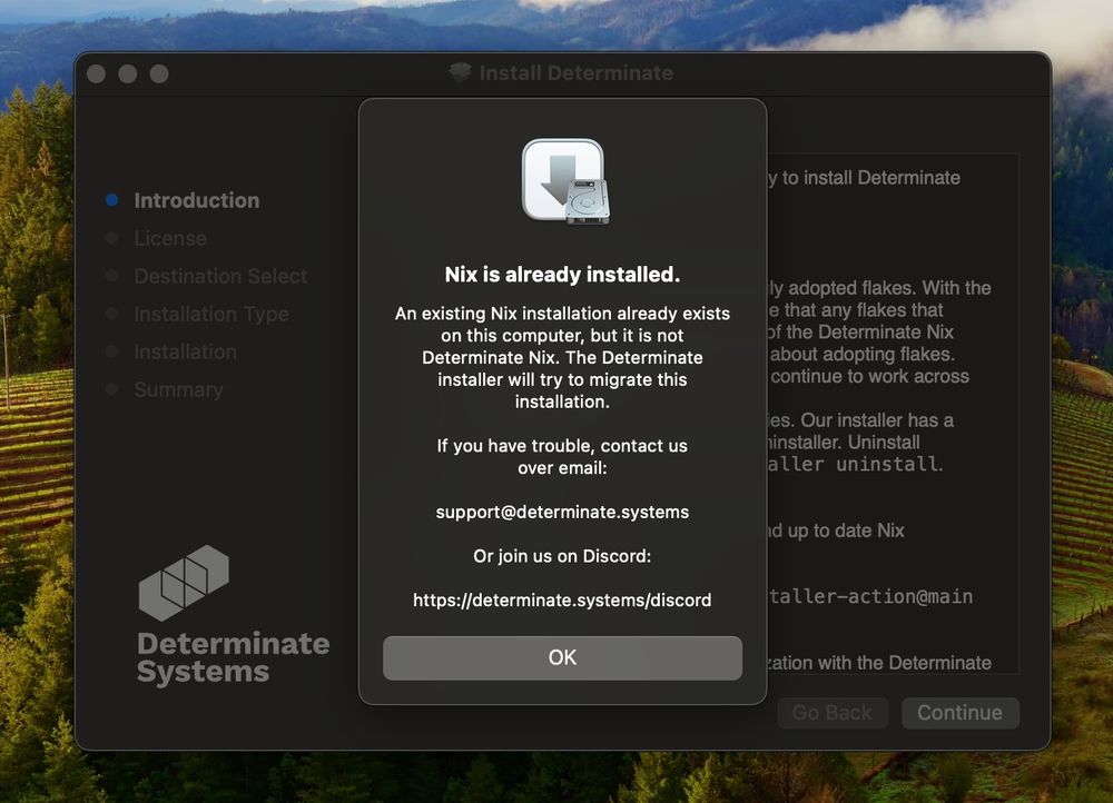 The Determinate installer on macOS, showing a notice that Nix is already installed, and that they can migrate to Determinate.