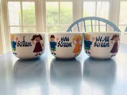 Photo of 3 very cute hand painted ice cream bowls. They are 3 bowls from a set of 4. The 1st bowl says I scream, the second says you scream, the third says we all scream. The 4th bowl, "For ice cream" is missing, so there's just a lot of contextless screaming going on with these bowls now. 