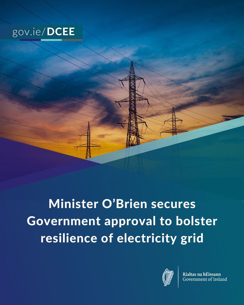 Minister O’Brien announces government approval to enhance electricity grid resilience, with power lines silhouetted against a sunset.